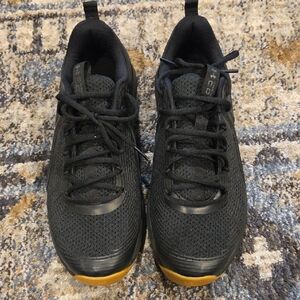 Under Armour Black and Gold Athletic Shoes with Breathable Mesh